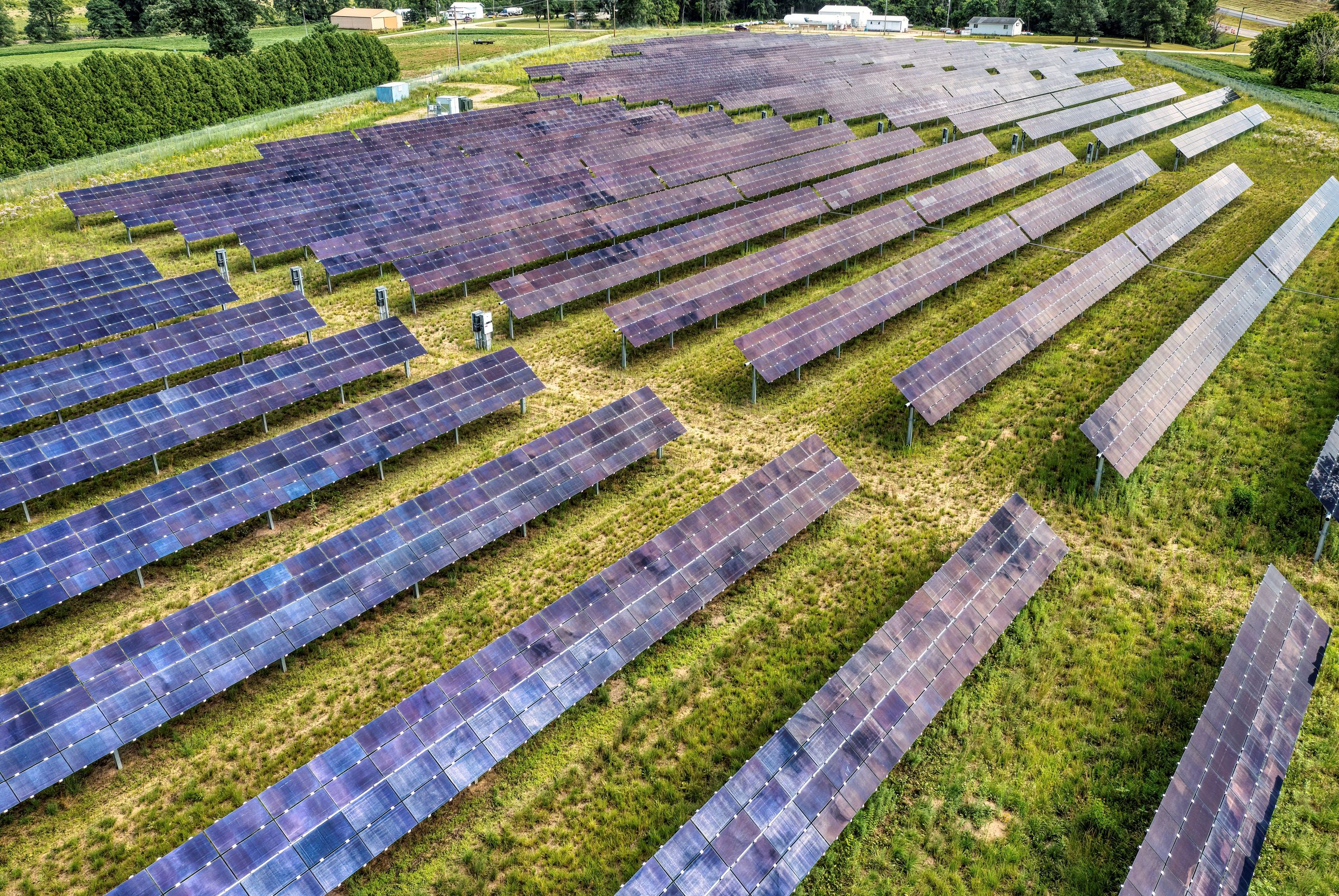 Ground-mounted solar panels across a utility-scale solar site